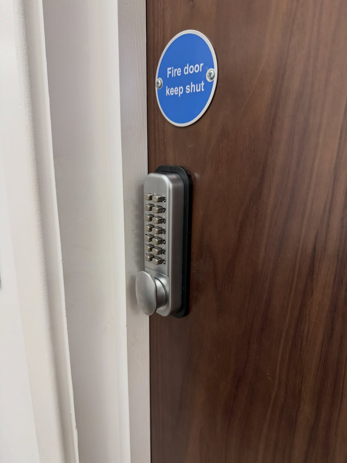 Digital lock fitted to brown commercial office door in Northumberland